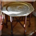 F14. Etched brass tray with stand. 